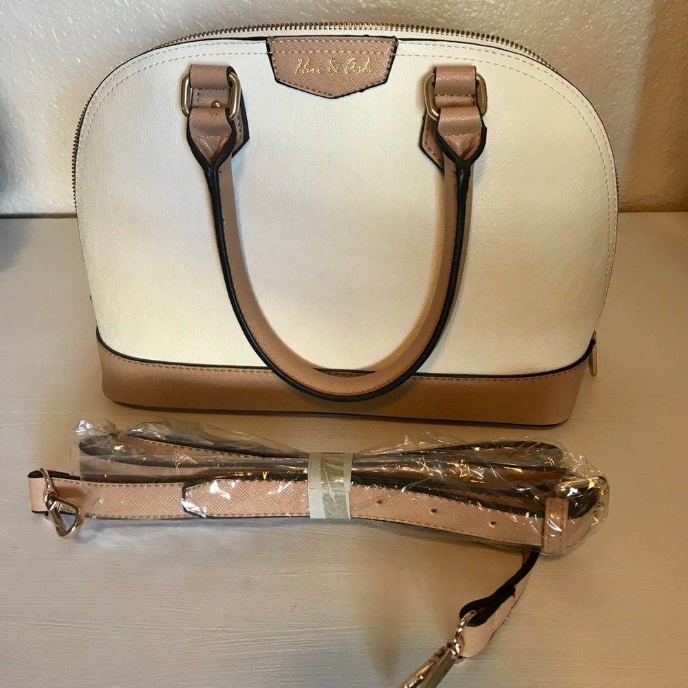 Cream and tan purse.